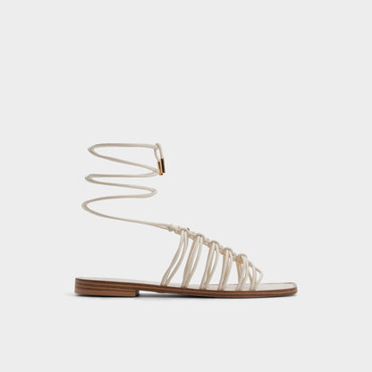 Unoma in White Bone - Strappy flat sandal | Aldo Classic