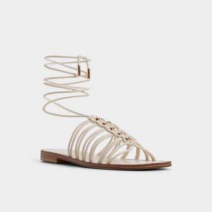 Unoma in White Bone - Strappy flat sandal | Aldo Classic