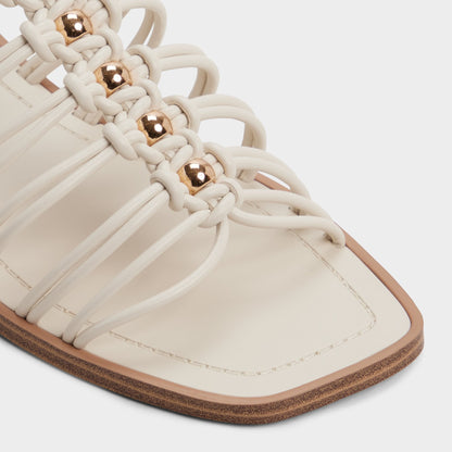Unoma in White Bone - Strappy flat sandal | Aldo Classic