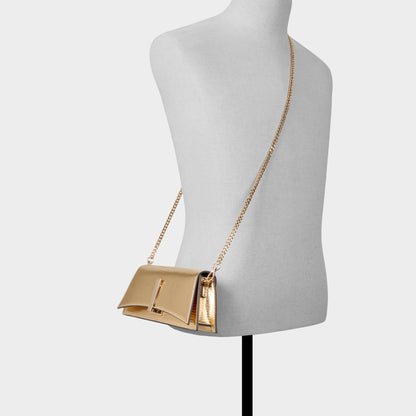 Mmychaelaa in Gold - Clutch | Aldo Featured