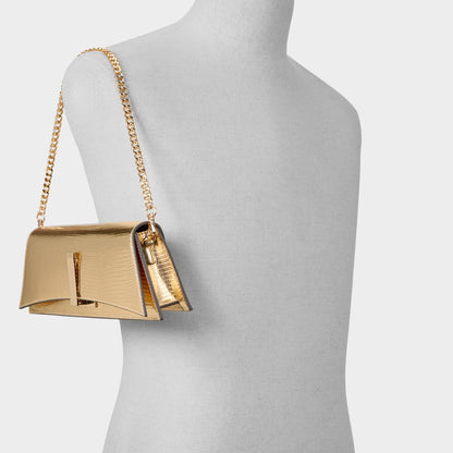 Mmychaelaa in Gold - Clutch | Aldo Featured